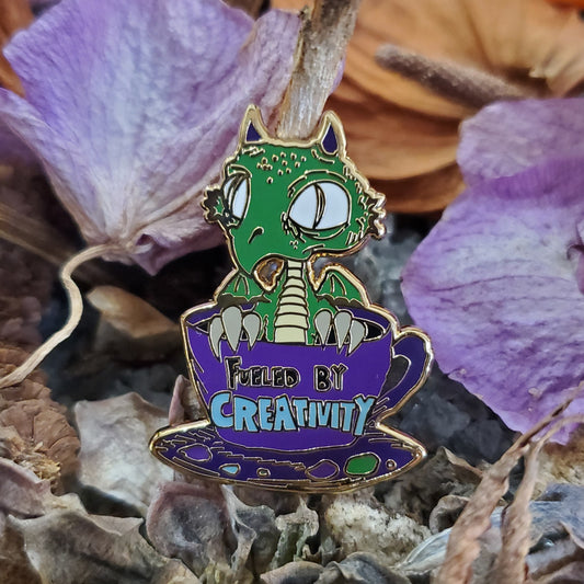"Fueled by Creativity" Derpy Dragon Pin