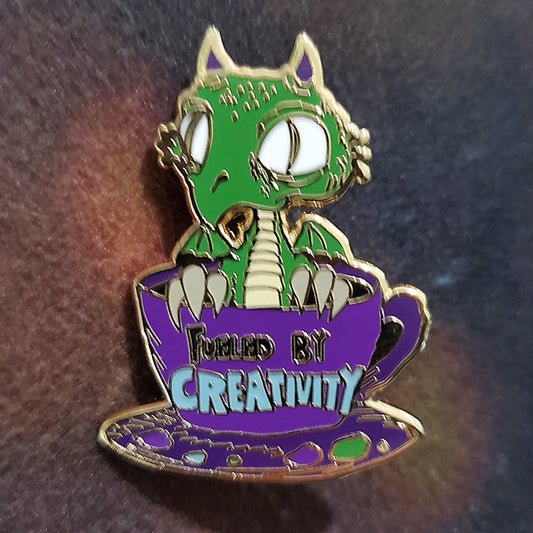 "Fueled by Creativity" Derpy Dragon Pin