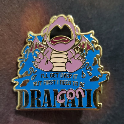 "I'll get over it, I just need to be dragonic(dramatic) first" Derpy Dragon Pin